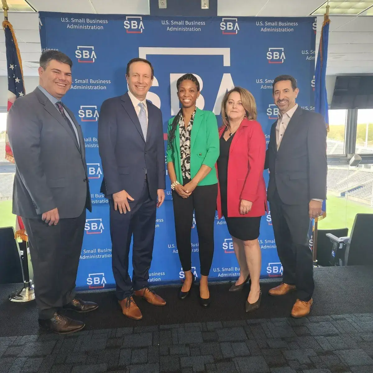 Alisha Simpson-Watt with officials at the 2023 SBA Small Business Awards